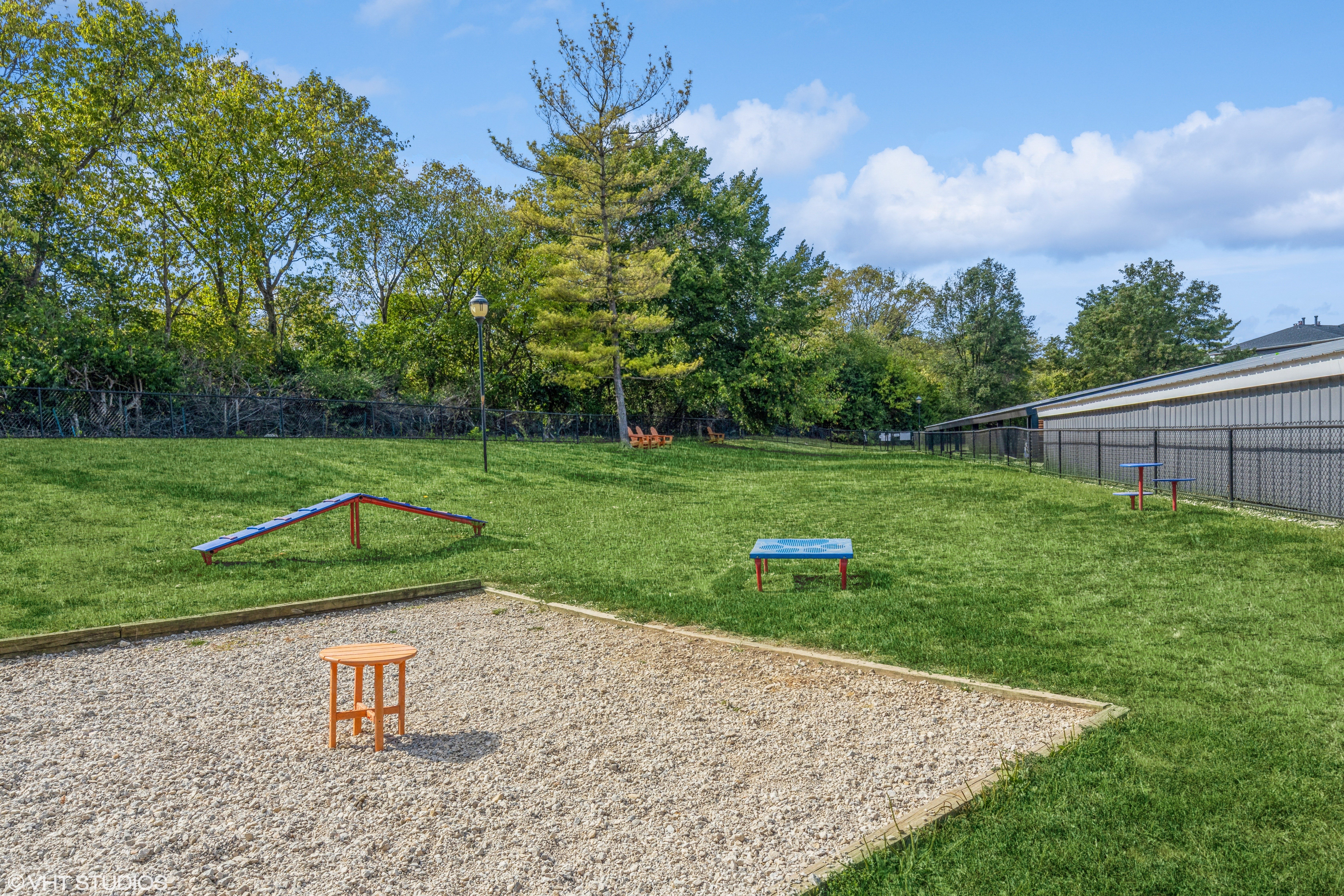 community dog park with agility equipment