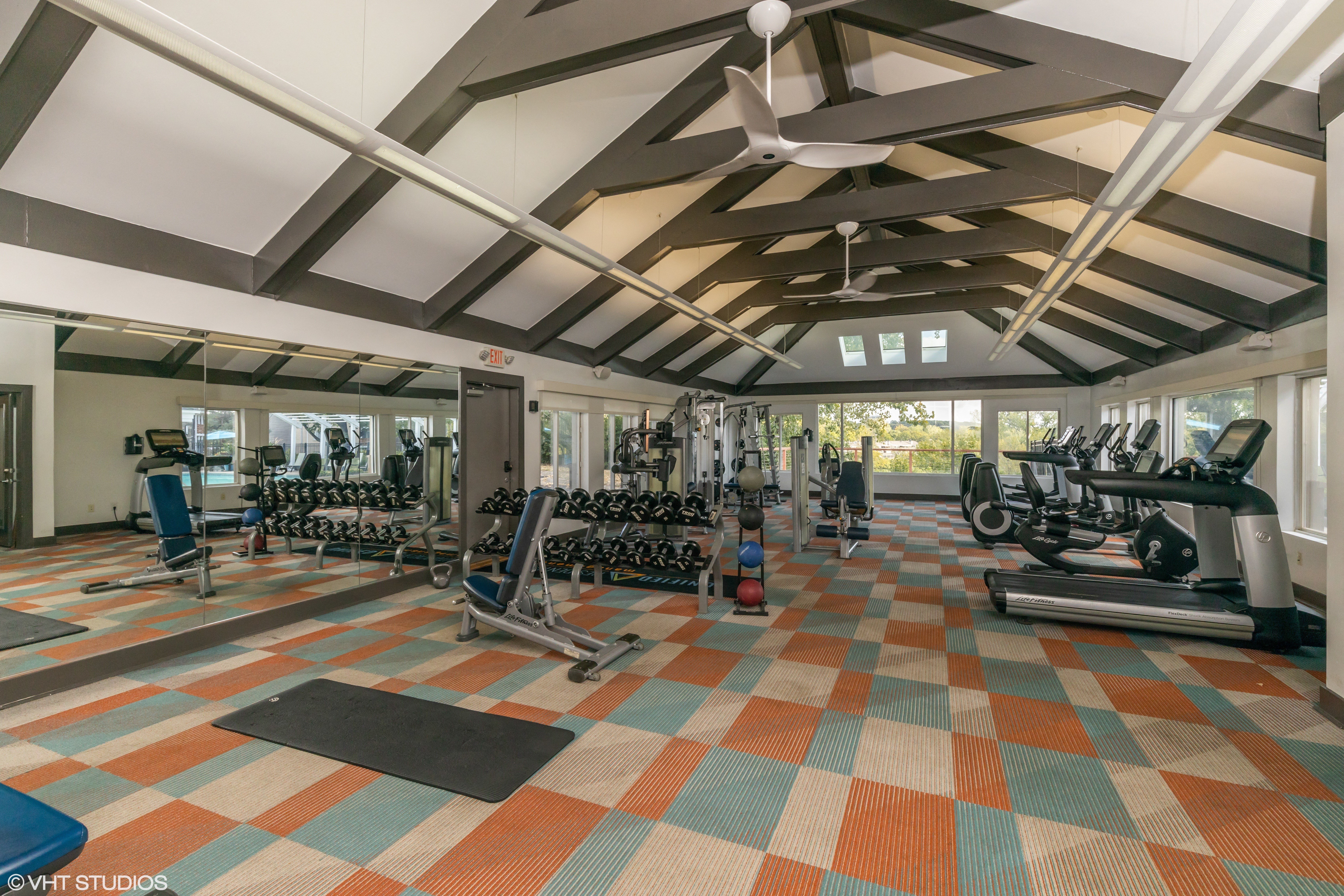 community fitness center with weight and cardio equipment 1