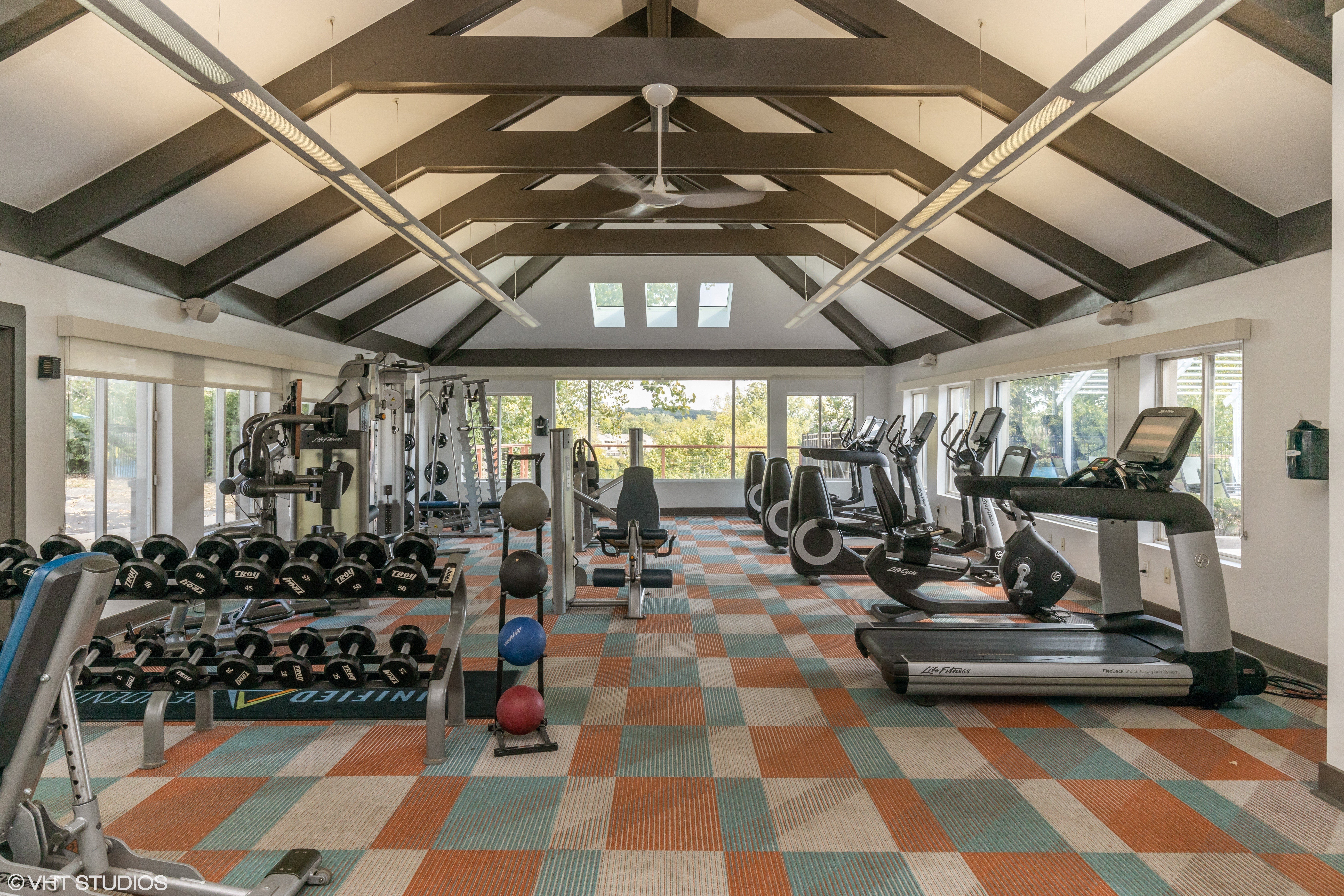 community fitness center with weight and cardio equipment 2